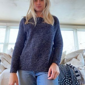 Navy blue sweater with zippers on the sides